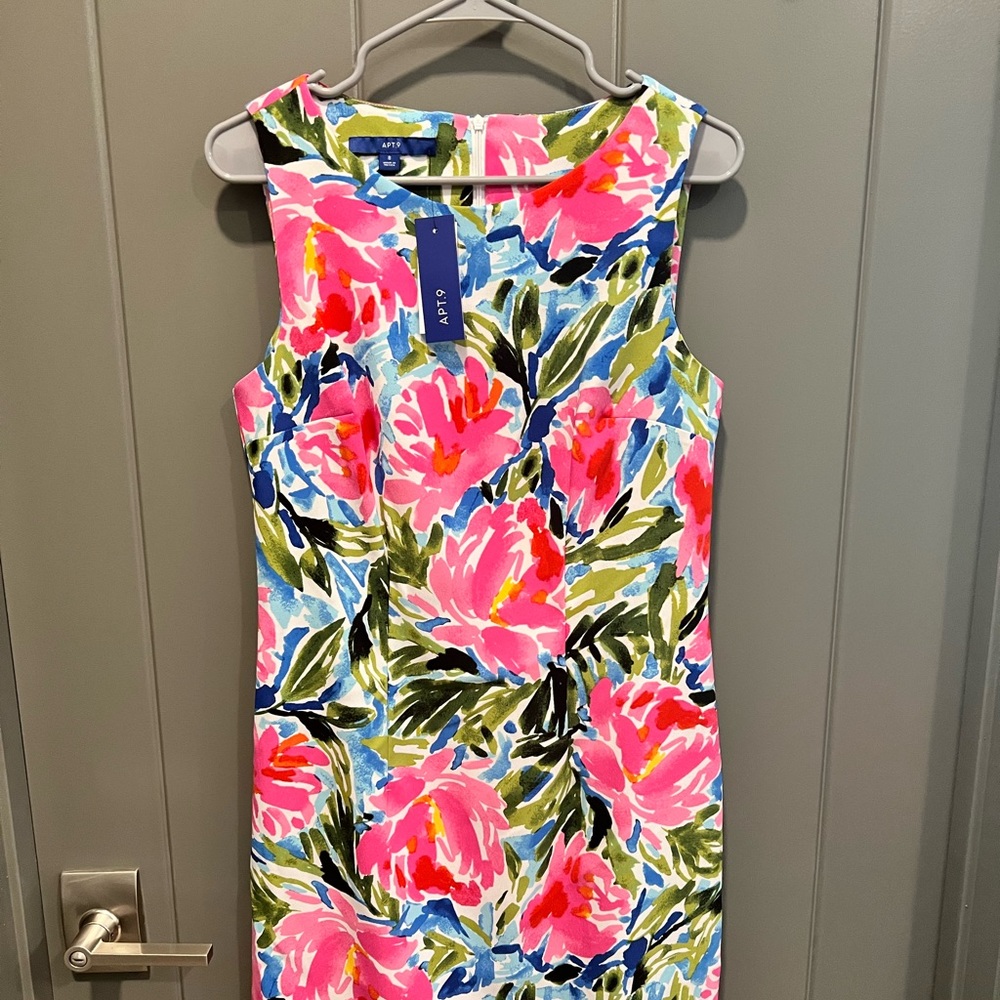 Brand new, with tags. Beautiful fitted dress.